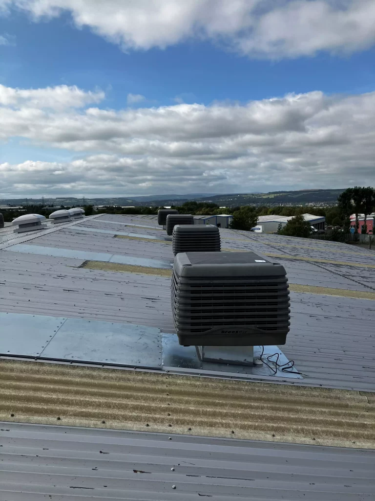 Breez Air units on roof of industrial building